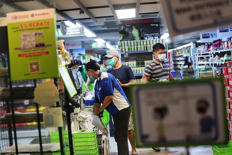 The Sheng Siong supermarket at Junction 10. When the pandemic situation normalises, the group expects revenue to taper off from the current elevated levels as buffer stocks kept by households are consumed.