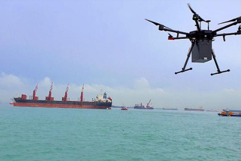 A drone delivery trial flight by local start-up F-drones last December. F-drones is the first company to receive authorisation from the Civil Aviation Authority of Singapore for such deliveries. The service's first delivery here, of a parcel containi
