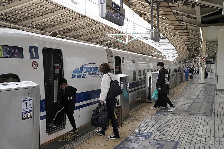 There has been a drastic fall in the number of passengers for the shinkansen bullet train in Japan, as the country acts to curb movements amid the coronavirus pandemic. PHOTO: EPA-EFE
