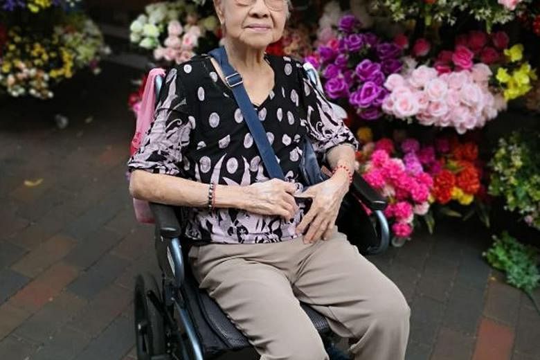 Madam Yap Lay Hong, 102, is among 16 residents and staff at the Lee Ah Mooi Old Age Home (far left) who caught the virus. Madam Yap, who was born during the Spanish flu pandemic in 1918, is fiercely independent even at her age, said Mr Then Kim Yuan,