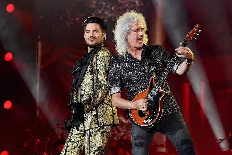 Adam Lambert (left) and Brian May of rock band Queen performing last year. Queen and Lambert have recorded a new version of We Are The Champions on their mobile phones under lockdown. 
