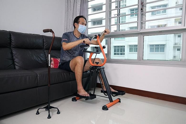 Mr Toh doing exercises at home to aid his recovery. He now requires a walking stick to support him in his movements. For 13 days, he had to rely on a ventilator to help him breathe. Left: Mr Toh Kai Kiat's neck still bears bruises from the tubes that