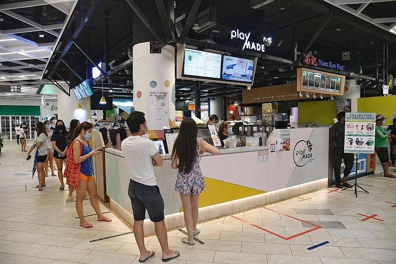 Bubble tea outlets such as Playmade at PLQ Mall (above) and iTea at Tampines Street 81 on April 21 were overwhelmed after more businesses were told to temporarily close at 11.59pm the same day. Koi teamed up with online restaurant Grain to offer bubble te