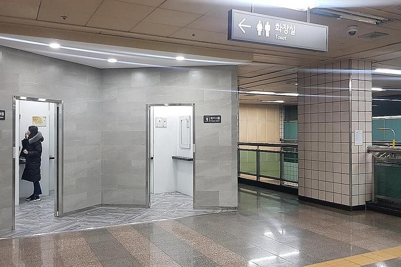 South Korean Ham Jung-min, 22, with the contents of his make-up pouch. He finds that his face looks better with make-up. Samgakji subway station in central Seoul features two powder rooms - one for women and one for men. With more men using make-up, 