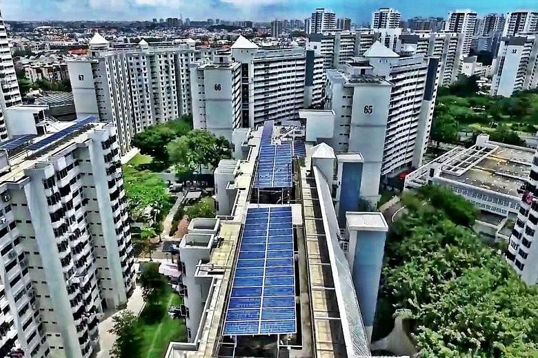 Solar panels installed by energy company Sunseap on Housing Board rooftops. Singapore achieved its 2020 solar deployment target of 350 megawatt-peak in the first quarter. PHOTO: SUNSEAP