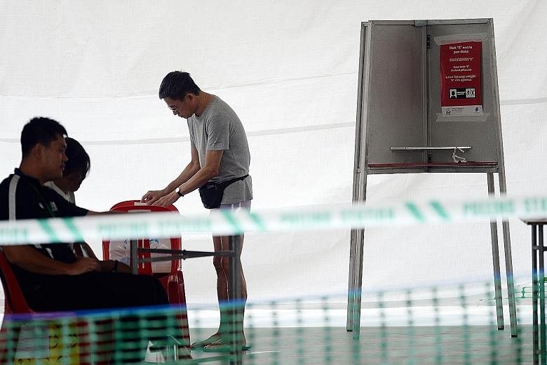 The Parliamentary Elections (Covid-19 Special Arrangements) Act is to ensure the safety of voters, candidates and election officials should Singaporeans have to go to the polls before the pandemic ends. ST PHOTO: JOYCE FANG