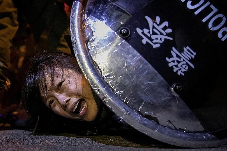 Reuters has won the 2020 Pulitzer Prize in breaking news photography for its series on the protests in Hong Kong last year. Among the winning images shot by Reuters was this one of an anti-extradition Bill protester being detained by Hong Kong riot p