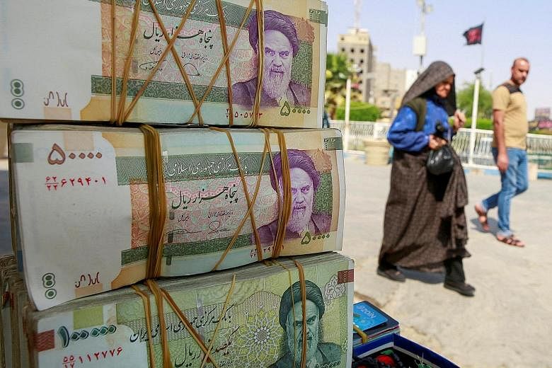 Since 2018, when the Trump administration repudiated the nuclear agreement and reimposed sanctions on Iran, the value of the Iranian currency, the rial (above), has fallen by roughly 60 per cent.