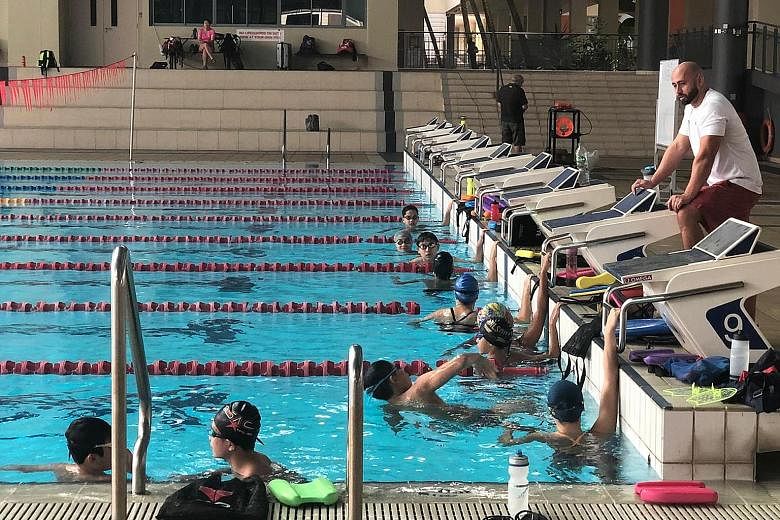American Doug Djang, 35, sees positives in the enforced Covid circuit breaker, in that it allows student-athletes to reflect on their goals and process. Swimmers Julia Lium and Ritchie Oh say their stroke efficiency has improved under his guidance.