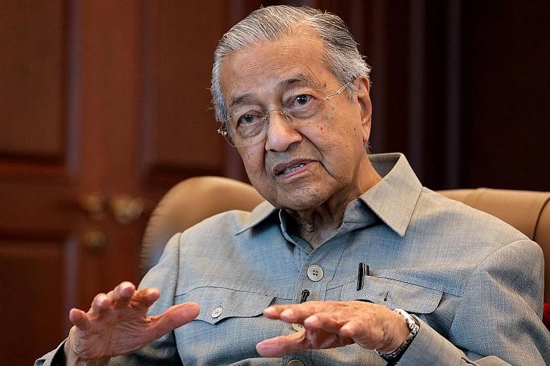Tun Dr Mahathir Mohamad resigned as Malaysia's premier on Feb 24, a move which led to the collapse of his coalition government. PHOTO: REUTERS