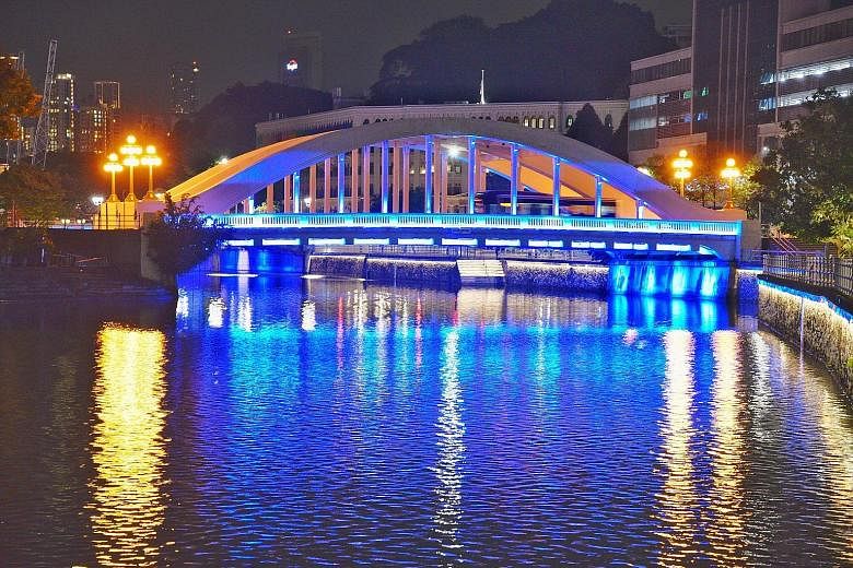 Cavenagh Bridge (above) and Elgin Bridge (below) were also among the 30 or so landmarks here that were lit in blue last night. Participating venues will light up for varying periods from 8pm every Thursday until the circuit breaker ends on June 1.