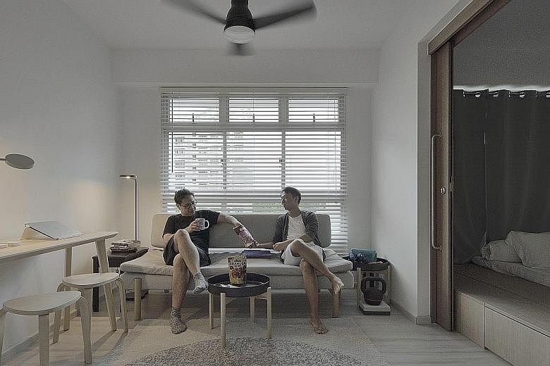 Designed by home owner Soh Chee Lip (above right), the two-room HDB flat gives the content marketeer space to think, work out and relax.