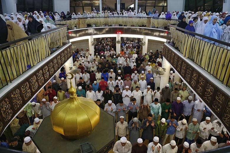 Muslims in Singapore at evening prayers to mark the eve of the first day of Ramadan in 2015.