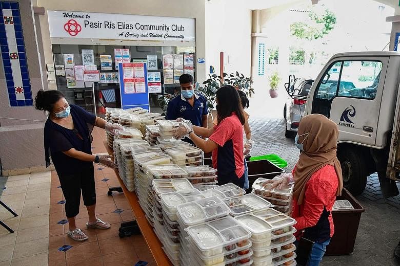 An SGUnited Buka Puasa distribution point at the Pasir Ris Elias Community Club. The initiative provides meals to healthcare workers and their families, the Islamic Religious Council of Singapore's zakat beneficiaries, as well as other families who r