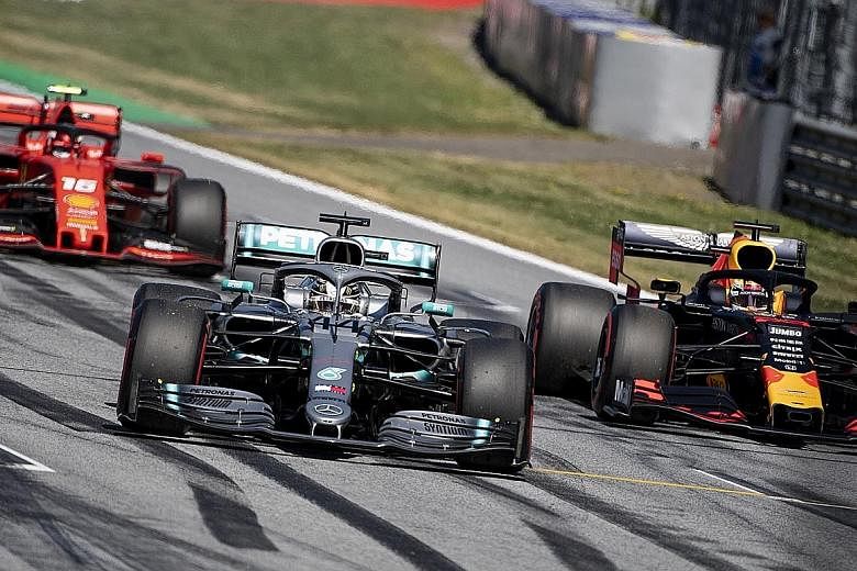 From left: Ferrari's Charles Leclerc, Mercedes' Lewis Hamilton and Red Bull's Max Verstappen in qualifying for last year's Austrian GP. Formula One is targeting to start this season in Spielberg in July with back-to-back races. PHOTO: EPA-EFE