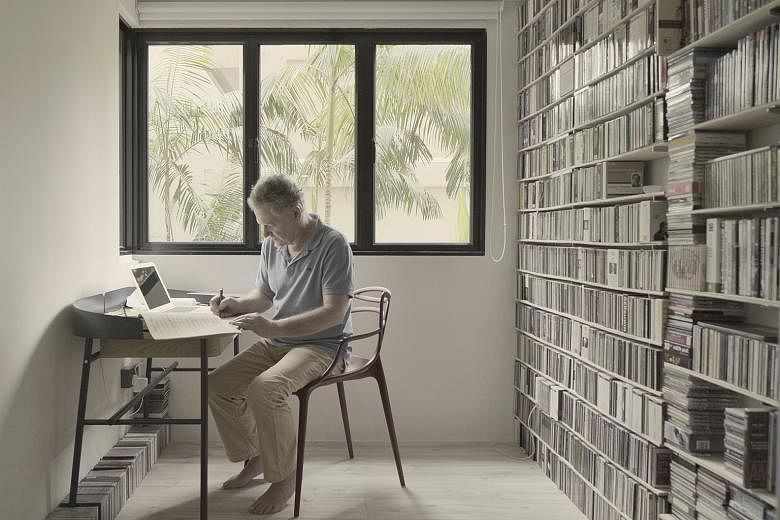 The four-room HBD flat of music teachers Pamela Krakauer and Peter Krakauer (above) houses two pianos – an August Forster and a Steinway M – and plenty of shelving.