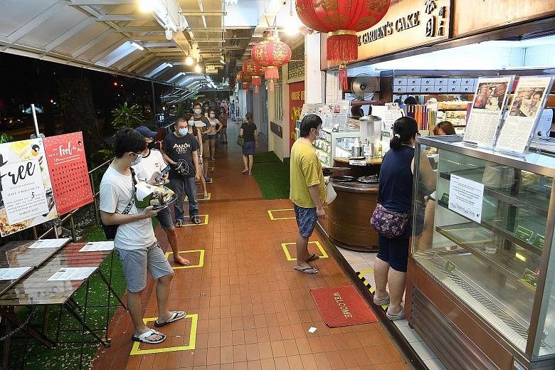 Customers queueing up at The Pine Garden's Ang Mo Kio outlet (top) on April 22, before tighter measures kicked in. The bakery, which has been calling up customers (above) to process refunds for their cancelled orders, will reopen all its six outlets 