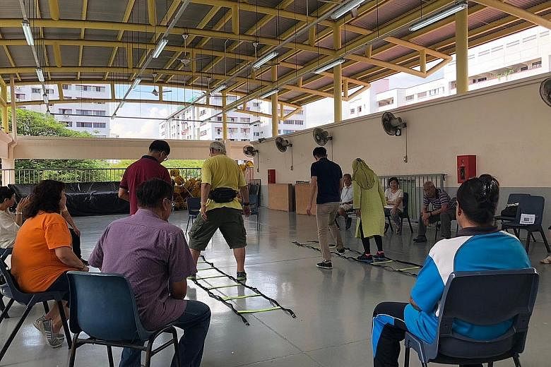 Participants in the Happy programme taking part in the physical and mental exercises at Bukit Panjang Community Centre prior to the circuit breaker.