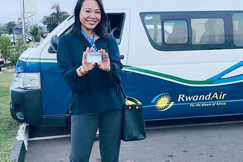 Ms Suzanna Seng (above and right), a Singaporean pilot at RwandAir, has made four trips to Guangzhou, China, to bring back medical supplies to Rwanda. Late last month, she flew Rwanda's first repatriation flight from London via Brussels, to bring hom