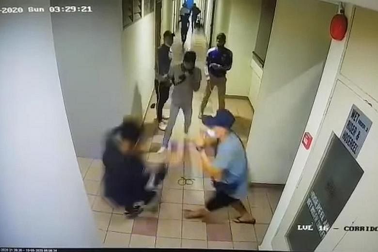 Left and below: The minute-long video clip, widely circulated on social media, shows a group of men being attacked by another group armed with parangs at the People's Park Centre building. It also shows a man being attacked by at least three people w