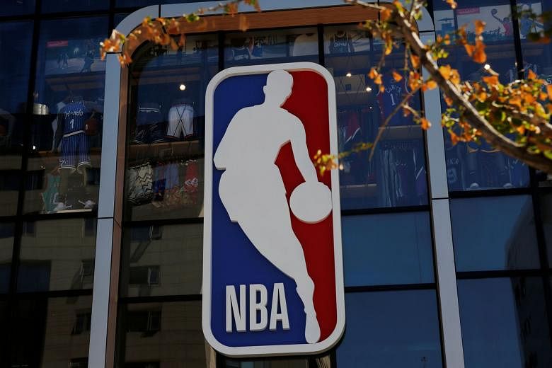 The NBA logo is seen at its flagship store in Beijing last year. The backlash has cast a cloud over its merchandising interests in China.