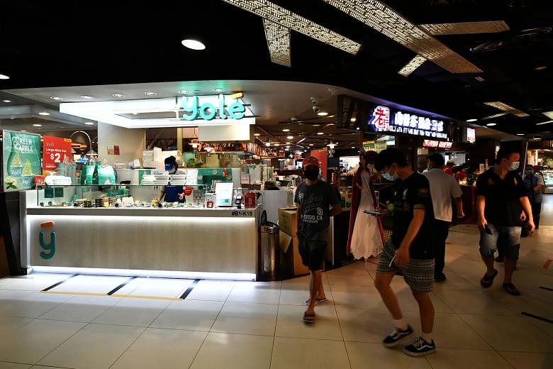 A Yole ice-cream shop open for business in Tampines Mall yesterday, the first day that some stores were allowed to reopen after a three-week shutdown as part of circuit breaker measures. ST PHOTO: LIM YAOHUI