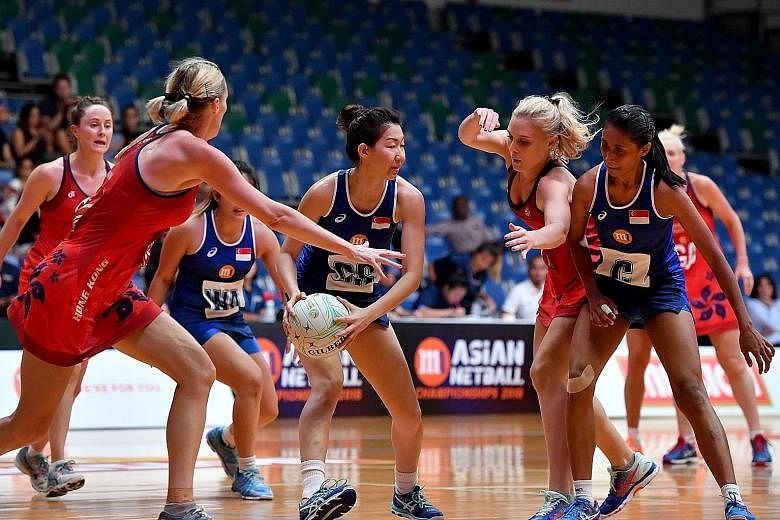 Singapore's women's floorball and netball teams competing at last year's SEA Games and the Asian Championship in 2018 respectively. Both sports will be included at next year's Asian Indoor and Martial Arts Games.