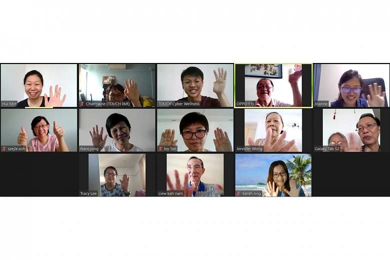 Retired taxi driver Chew Po Ngee (top row, second from right) having his first Zoom meet-up with fellow seniors, cyber wellness coaches and staff from Touch Community Services, which organised this video conference. Taking part in a digital readiness prog