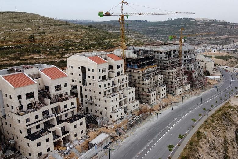Construction works in the Jewish settlement of Givat Zeev, near the Israeli-occupied West Bank city of Ramallah. The incoming Israeli government plans to annex Jewish settlements in the West Bank.