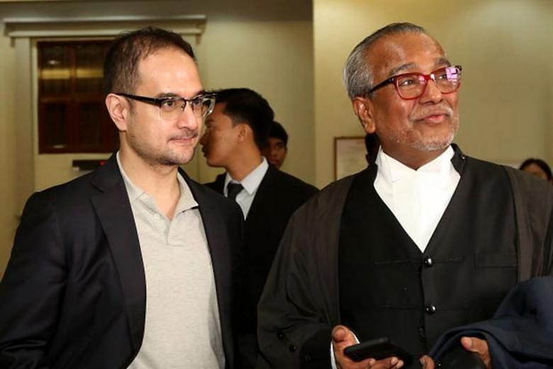 Mr Riza Aziz (far left) with his lawyer Tan Sri Muhammad Shafee Abdullah at the High Court in Kuala Lumpur after he was granted a discharge not amounting to an acquittal last Thursday. PHOTO: THE STAR/ASIA NEWS NETWORK