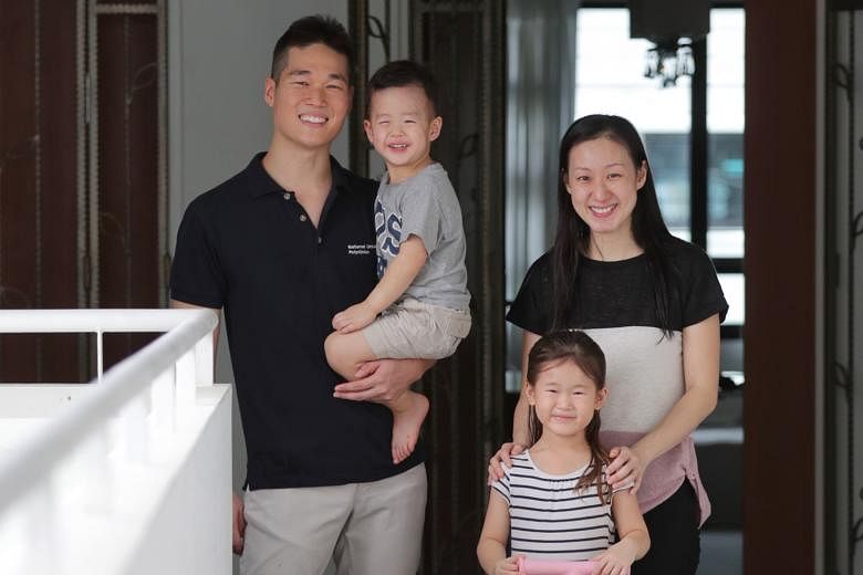 Dr Hou Minsheng, 32, a family physician at Choa Chu Kang Polyclinic, with his wife Deborah, also 32, a dentist by training, and their children - five-year-old Hannah and three-year-old Ethan.
