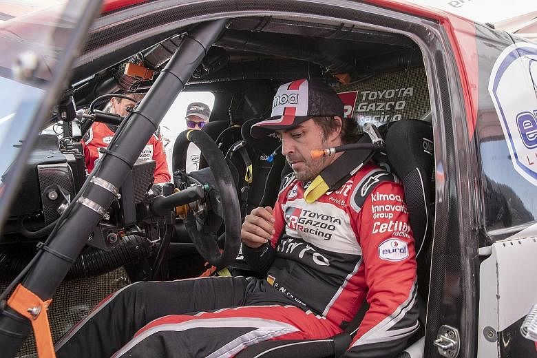 Fernando Alonso after Stage 8 of the Dakar Rally in January. He finished 13th overall in his debut. PHOTO: EPA-EFE
