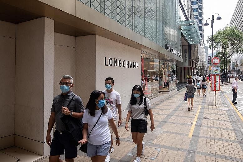 Canton Road, a luxury retail strip in Hong Kong's Tsim Sha Tsui district, earlier this month. Retail in Hong Kong, once deemed one of the world's best shopping destinations, is a shadow of its former self. Retail sales by value sank 42 per cent in Ma