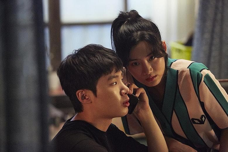 Kim Dong-hee (above left) and Park Ju-hyun (above right) play two students who get involved in illegal activities in Extracurricular.