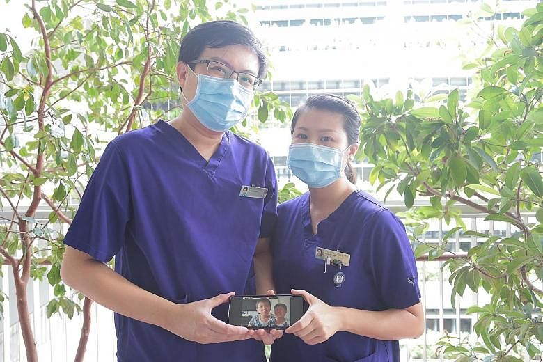 Nurse clinician Chan Zhi Qiang and his nurse manager wife Lynette Thng with a photo of their three-year-old twin boys Brayden and Ethan. Aside from teaching their loved ones the importance of keeping clean, the couple also remind their patients to pr