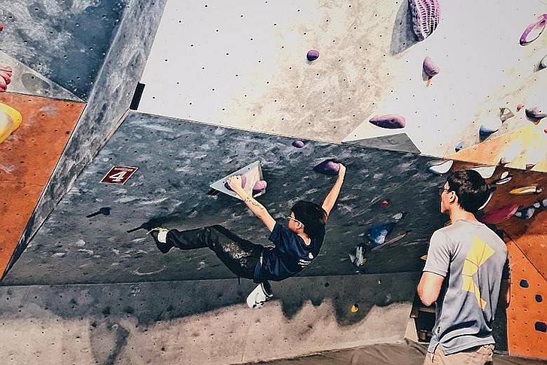 Primary 6 pupil Dylan Seow, 11, participating in a rock-climbing competition last year. He is applying for this year's Direct School Admission exercise through the sport.