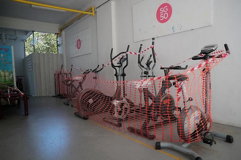 Exercise machines taped off at the void deck of an HDB block in Teban Gardens, as circuit breaker measures continue.