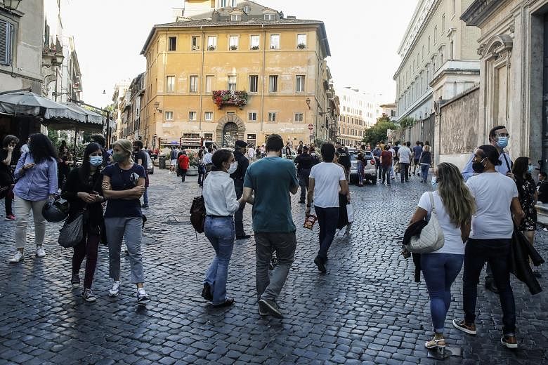 People enjoying an evening out in Rome's Trastevere district on Saturday. Tourism is particularly critical to the economies of nations on the European continent's southern shores - such as Spain, France, Italy and especially Greece.