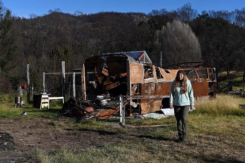 Recovery has been "slow and difficult" for many, says 66-year-old Wayne Keft, standing in front of the ruins of his house last Thursday. His home near Cobargo was destroyed when "a fireball went through the front of the house". Ms Anita Lawrence, 51,