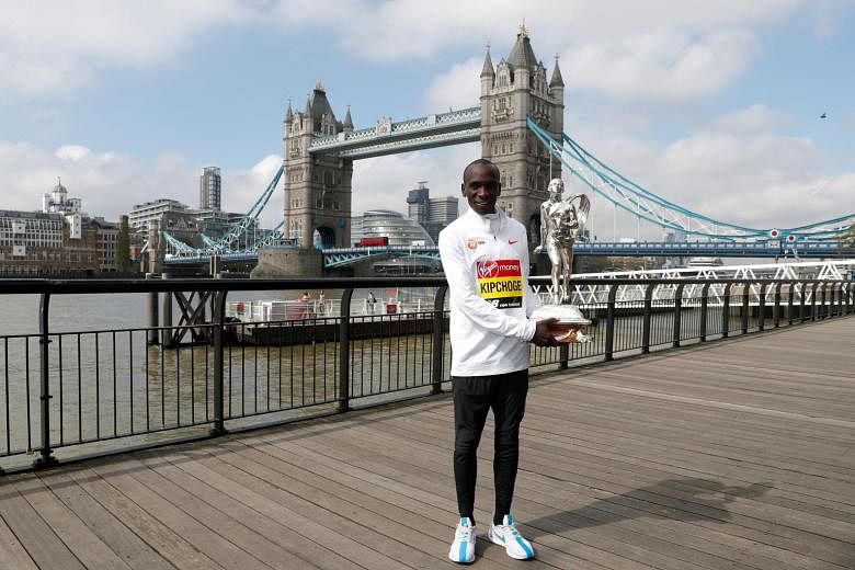 Kenya's Eliud Kipchoge after winning the London Marathon last year. The Olympic champion has partnered the Kenyan government and his personal sponsors to provide care packages for other Kenyan athletes. PHOTO: REUTERS