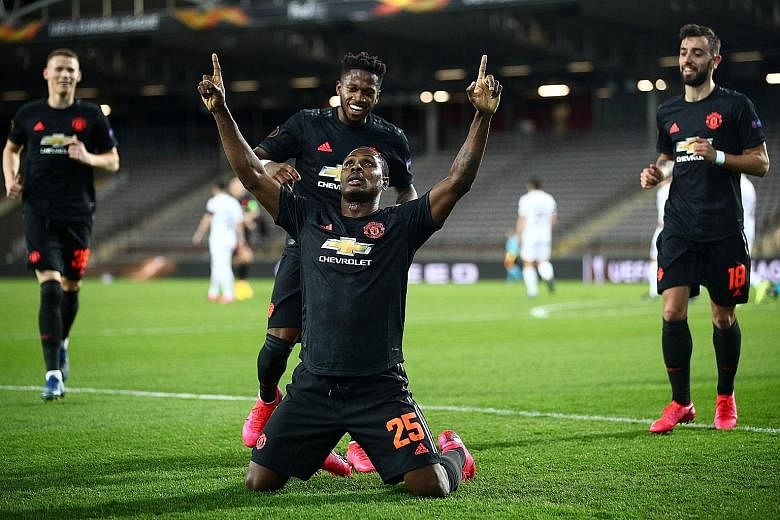 Brazilian Fred joins in the celebrations after Nigerian Odion Ighalo opens accounts for United in their 5-0 win in the first leg of their Europa League last-16 tie against Austria's Lask on March 12. It was United's last game before the coronavirus c
