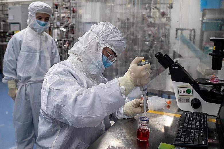 An engineer conducting tests on an experimental vaccine for the coronavirus at a biopharmaceutical company in Beijing last month.