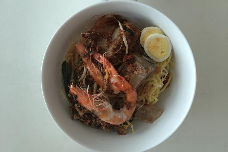 The 3 Combination Prawn Noodle comes with two crunchy and sweet mid-sized prawns.