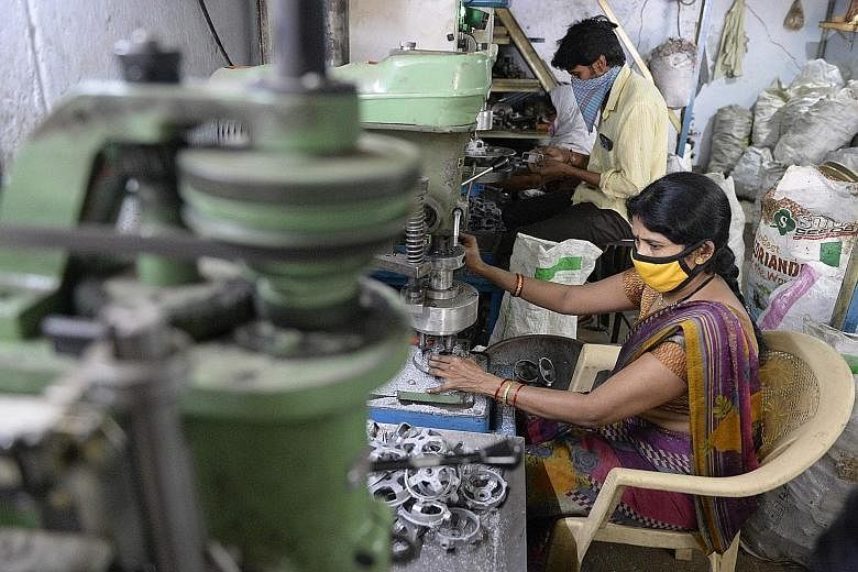 India has identified 12 sectors it can achieve self-reliance in. They include shoes, auto components, textiles, industrial machinery (above) and furniture, sectors which India wants to be global suppliers. But multiple labour laws, weak infrastructur