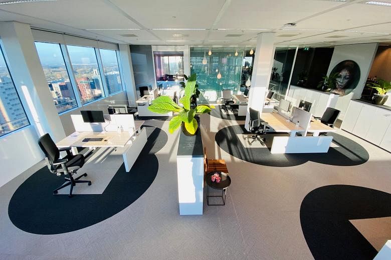 A prototype office of international real estate firm Cushman & Wakefield in Amsterdam that uses a workplace design concept that keeps desks at least 1.8m apart.