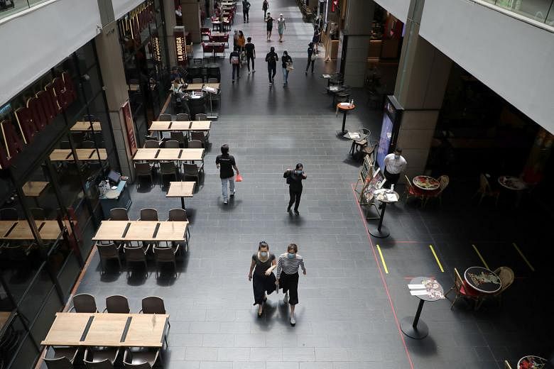 Restaurants were almost empty in a Kuala Lumpur mall during lunch time yesterday amid the Covid-19 outbreak. PHOTO: REUTERS
