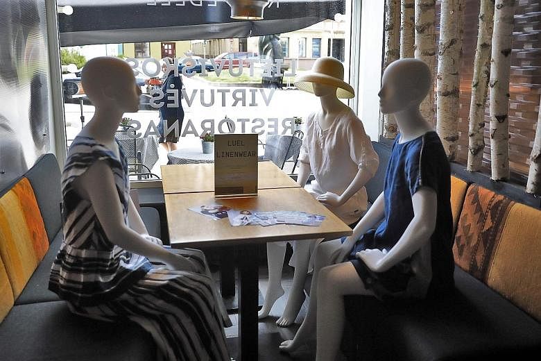 Just some ladies out for a spot of afternoon tea at a cafe (above) in Vilnius, Lithuania. 