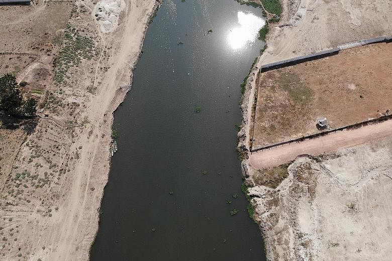 An aerial shot of a Mekong tributary outside Vientiane, Laos, where tests on a drone survey of plastic trash were done. Microplastics were also found to be abundant in the Mekong and Ganges rivers.