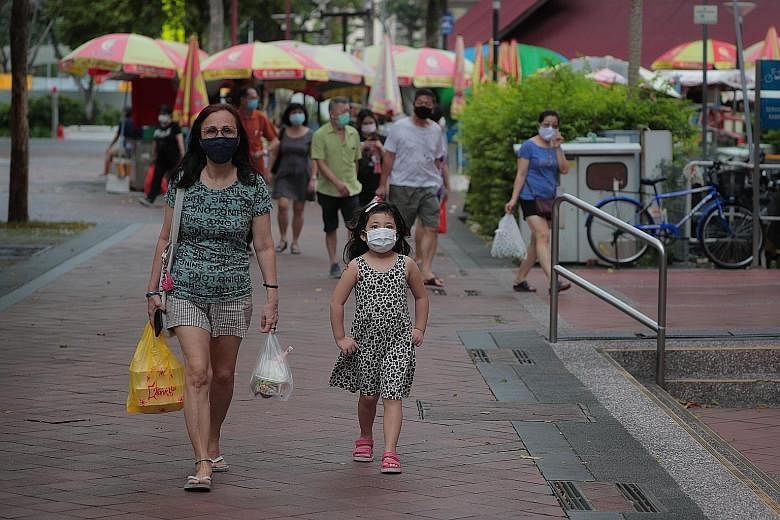 The task force tackling the Covid-19 outbreak has decided that face shields are not as effective as masks in reducing the risk of virus transmission, said Health Minister Gan Kim Yong. ST PHOTO: JASON QUAH