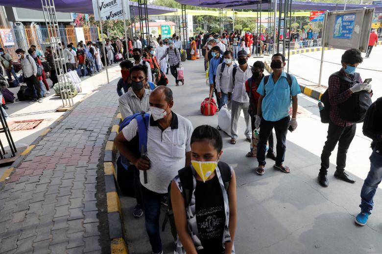 Long queues as Indian train services resume as coronavirus lockdown ...